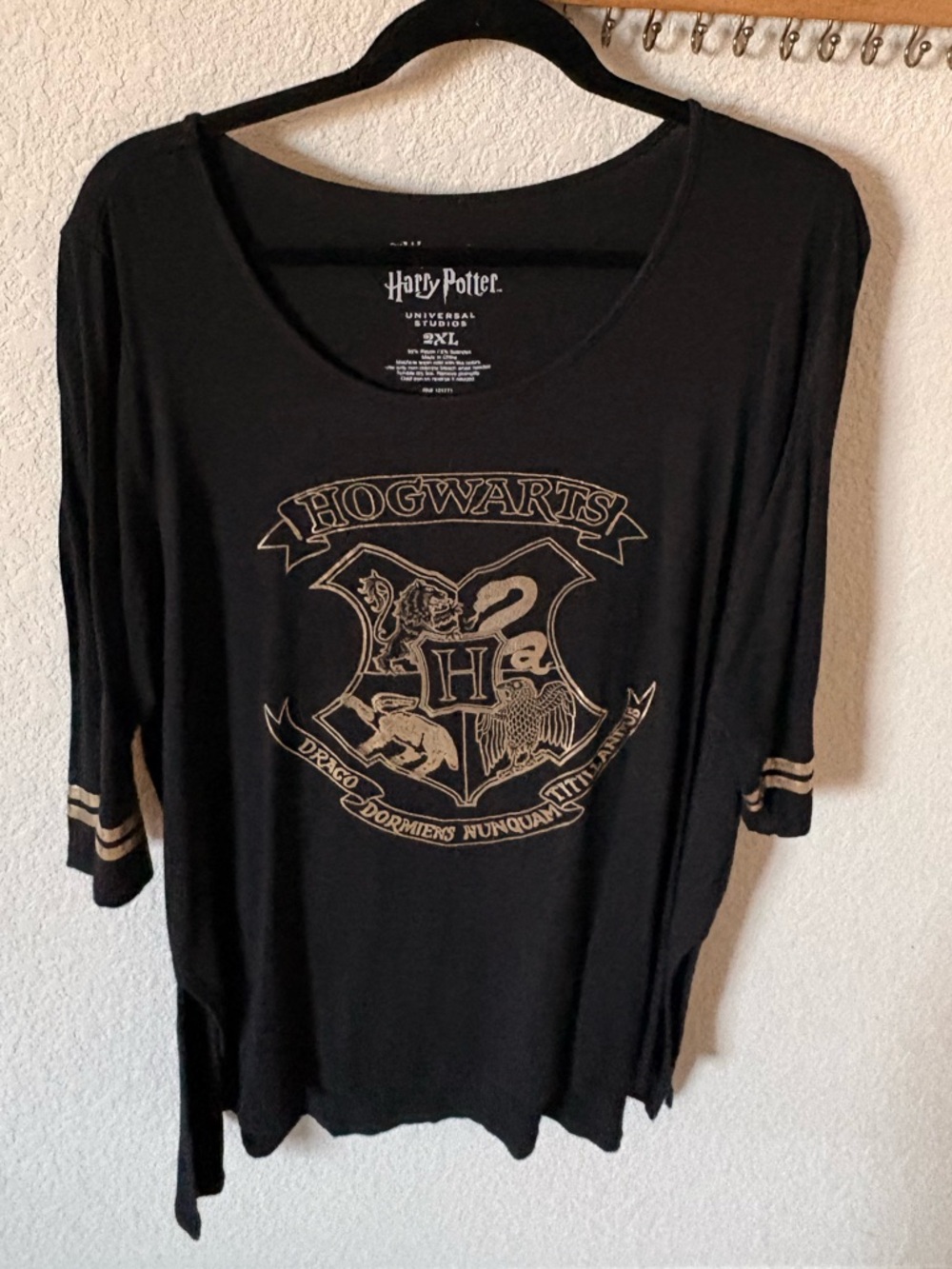 Warner Bros. Black T‑Shirt with Gold Harry Potter Crest